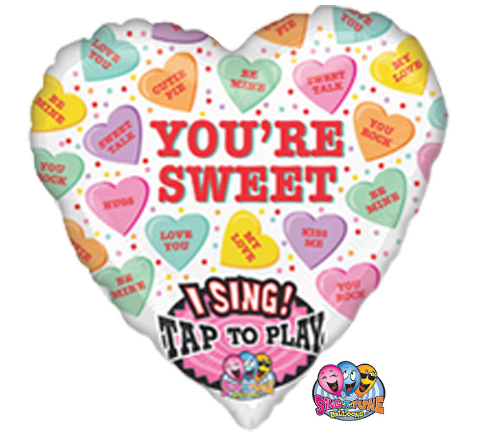 36 inch singing mylar heart shapped balloon with candy hearts, reads you'r sweet
